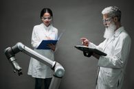Man in White Dress Shirt Holding Tablet Computer