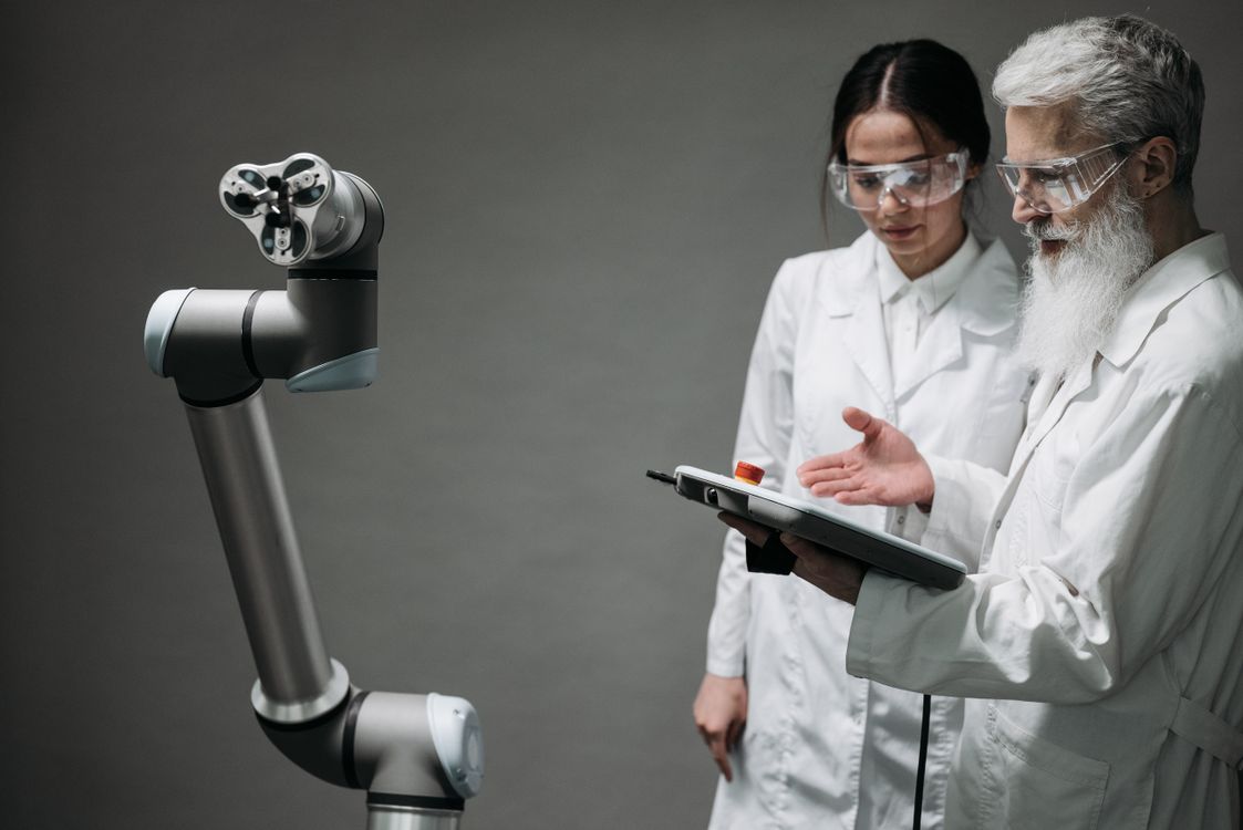 Scientists Testing a Device · Free Stock Photo