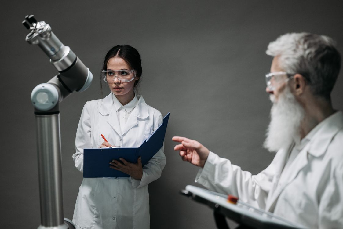 Scientists Testing a Device · Free Stock Photo