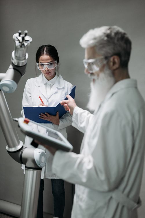 Scientists Testing a Device · Free Stock Photo