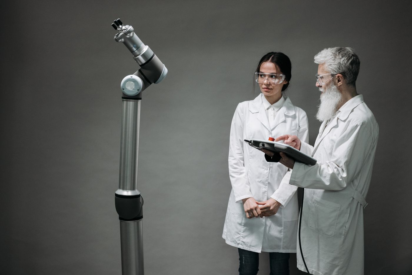 Researchers working with AI and robotics technology