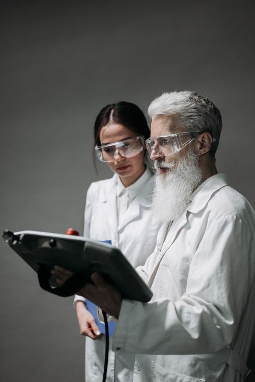 Scientists Testing a Device · Free Stock Photo