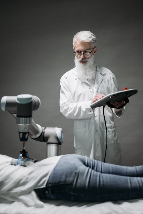 A Bearded Man Controlling a Robot