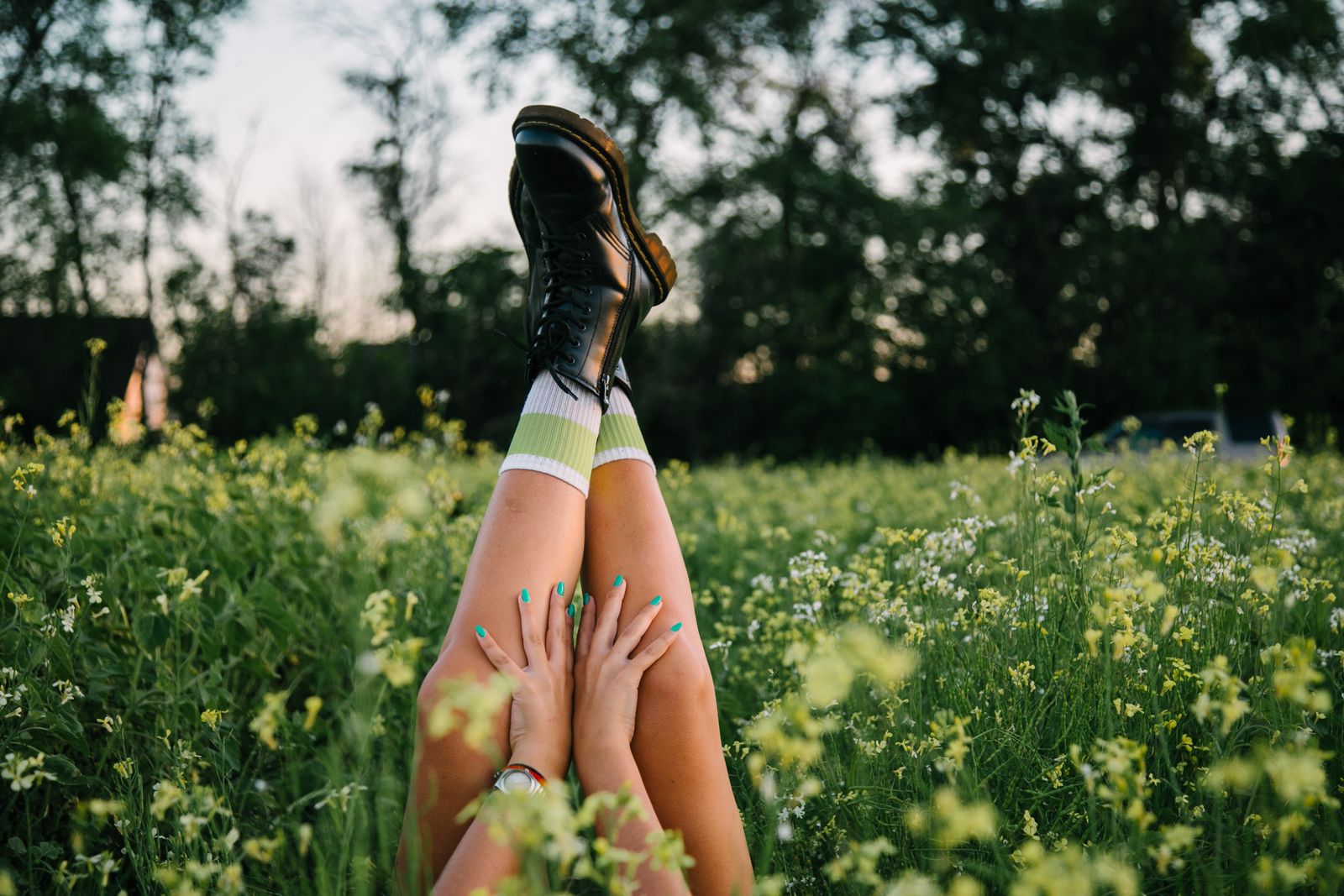 Runner stretching calves outdoors after training