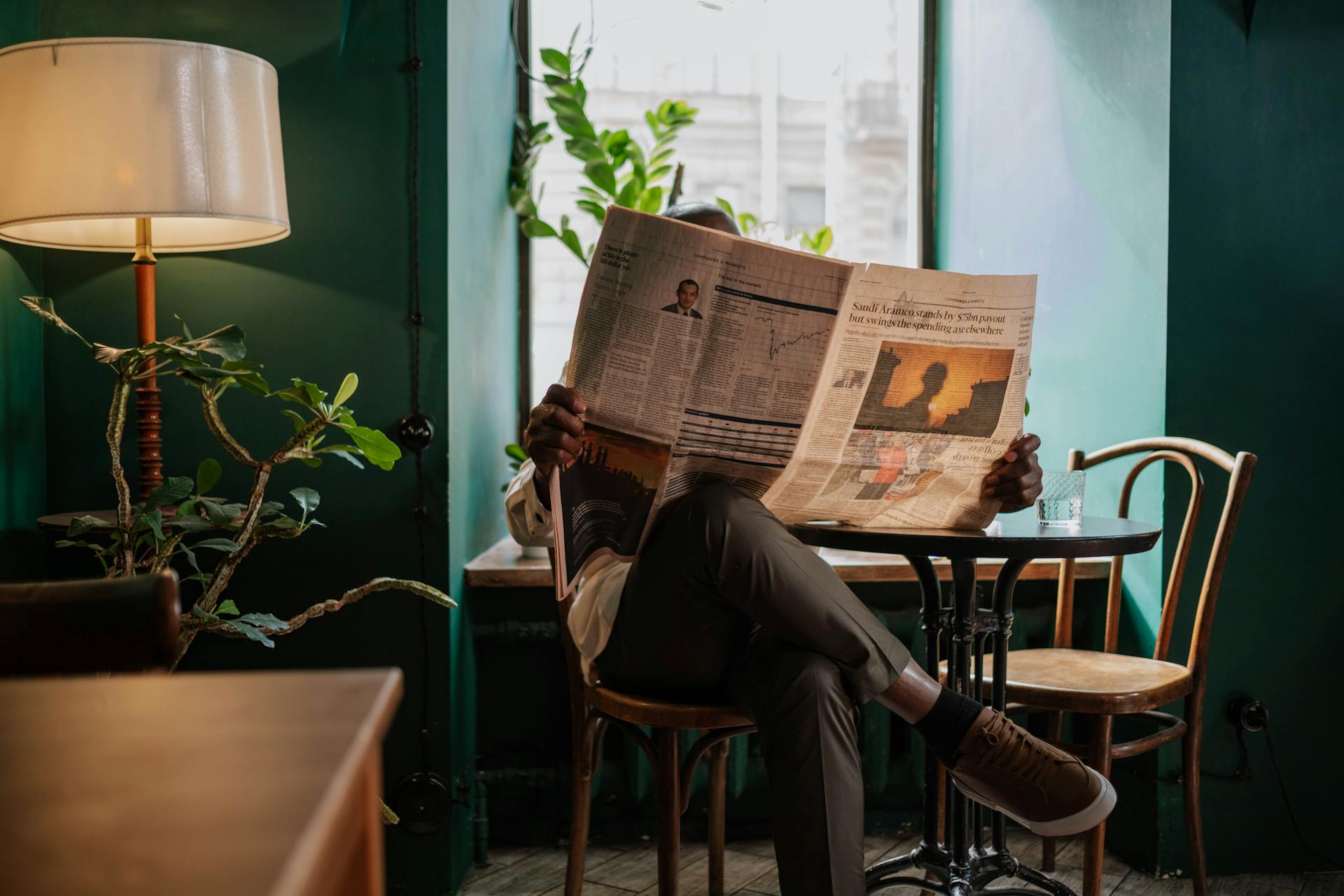 A Man Reading a Newspaper