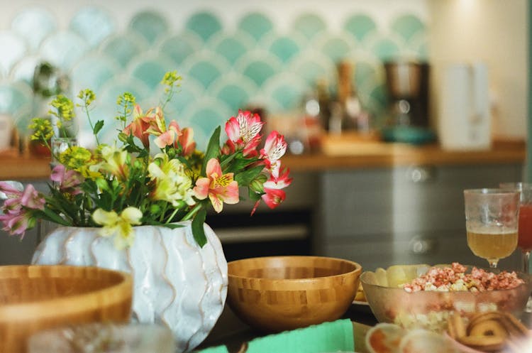 Alstroemeria Flowers In A Vase On A Kitchen Table 