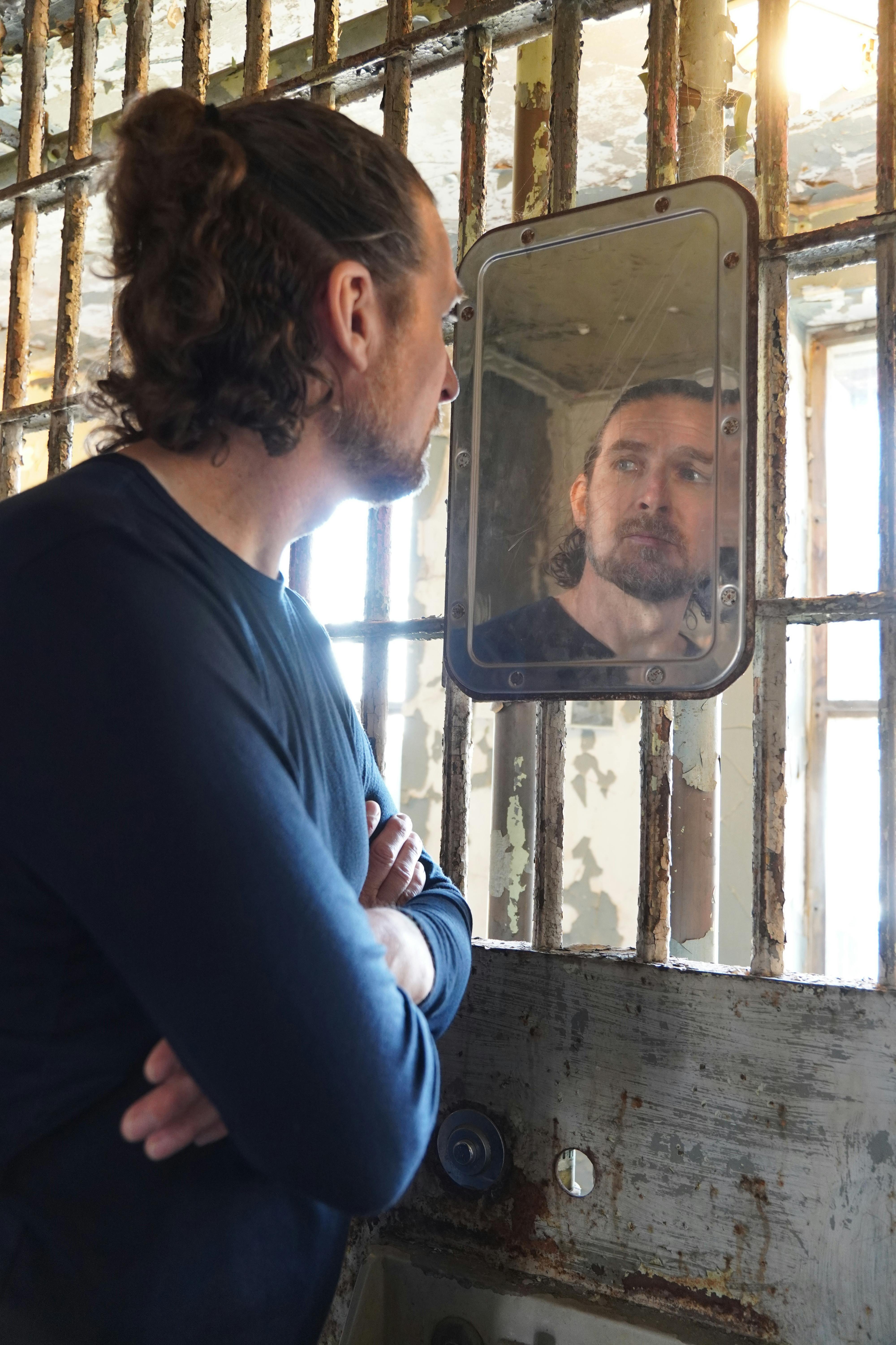 Nigerian business owner reviewing loan documents at a bank in Lagos 2026