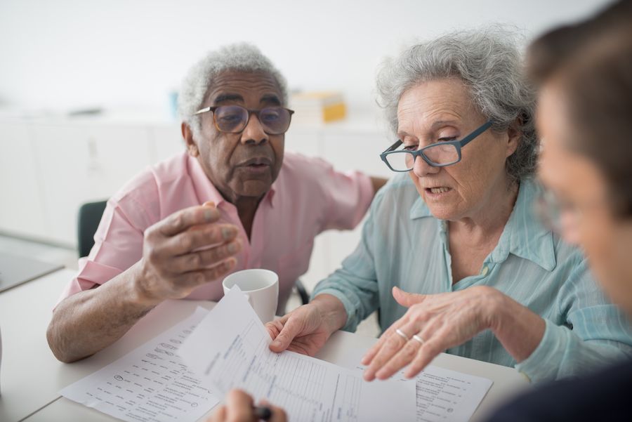 An advisor reviewing coverage details with a client