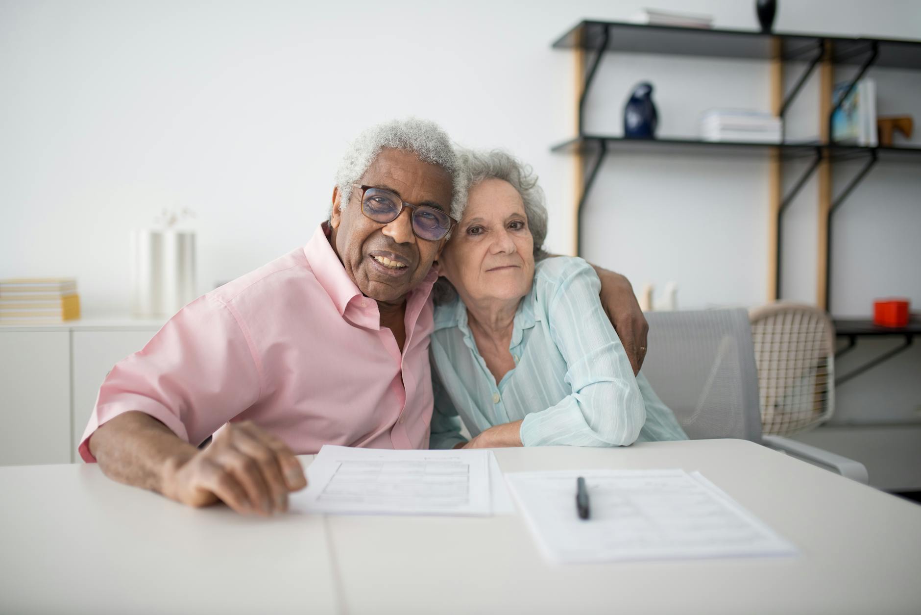 Mexican couple reviewing documents
