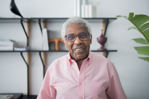 An Elderly Man in a Button Up Shirt 