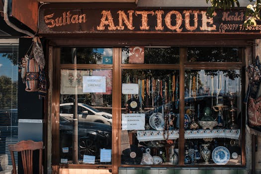 Front view of an antique shop in Balıkesir, Türkiye, showcasing vintage items and nostalgic decor.