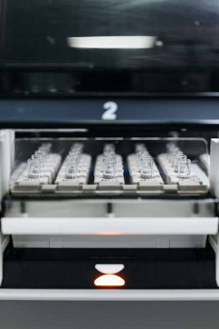 Vials in Machine in Laboratory