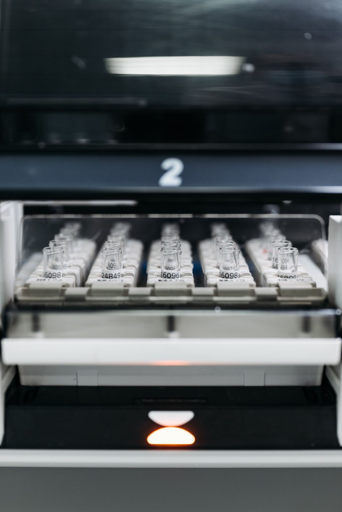 Laboratory vials in a modern scientific facility