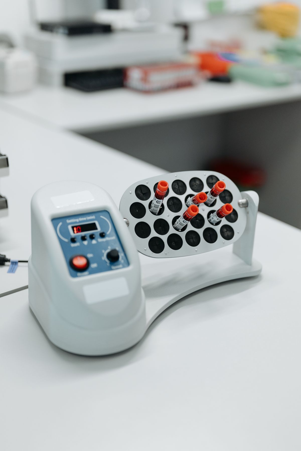 Laboratory rotator with research vials in a modern biotech laboratory