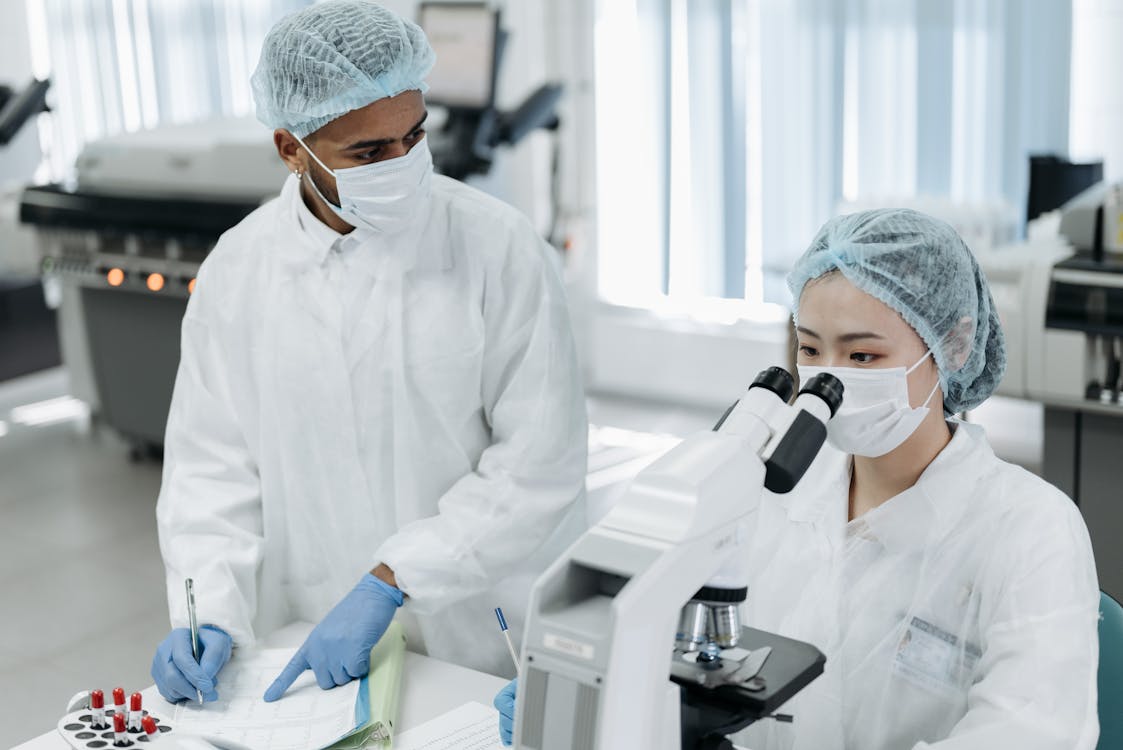 Free Two Laboratory Technicians at Work Stock Photo