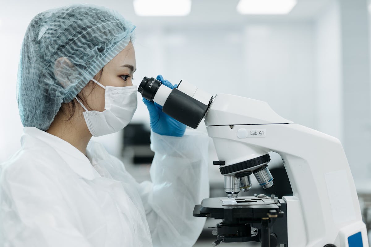 Healthcare professional reviewing medication data on a tablet