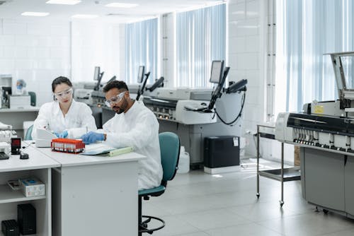 Free Medical Practitioners doing a research on a Lab  Stock Photo