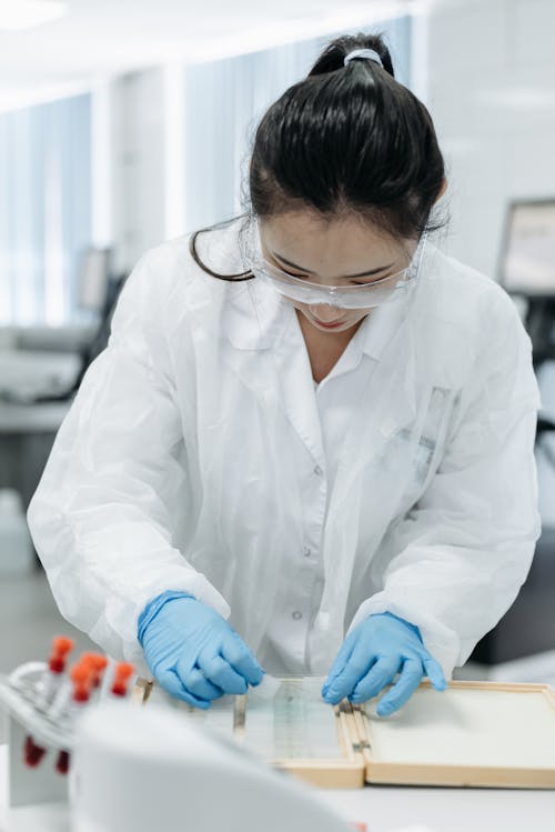 Woman Working on Samples in a Laboratory