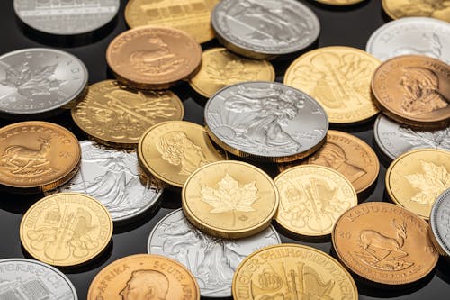 Collection of Silver and Gold Round Coins 