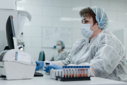 Female Medical Practitionerlooking at a Monitor 