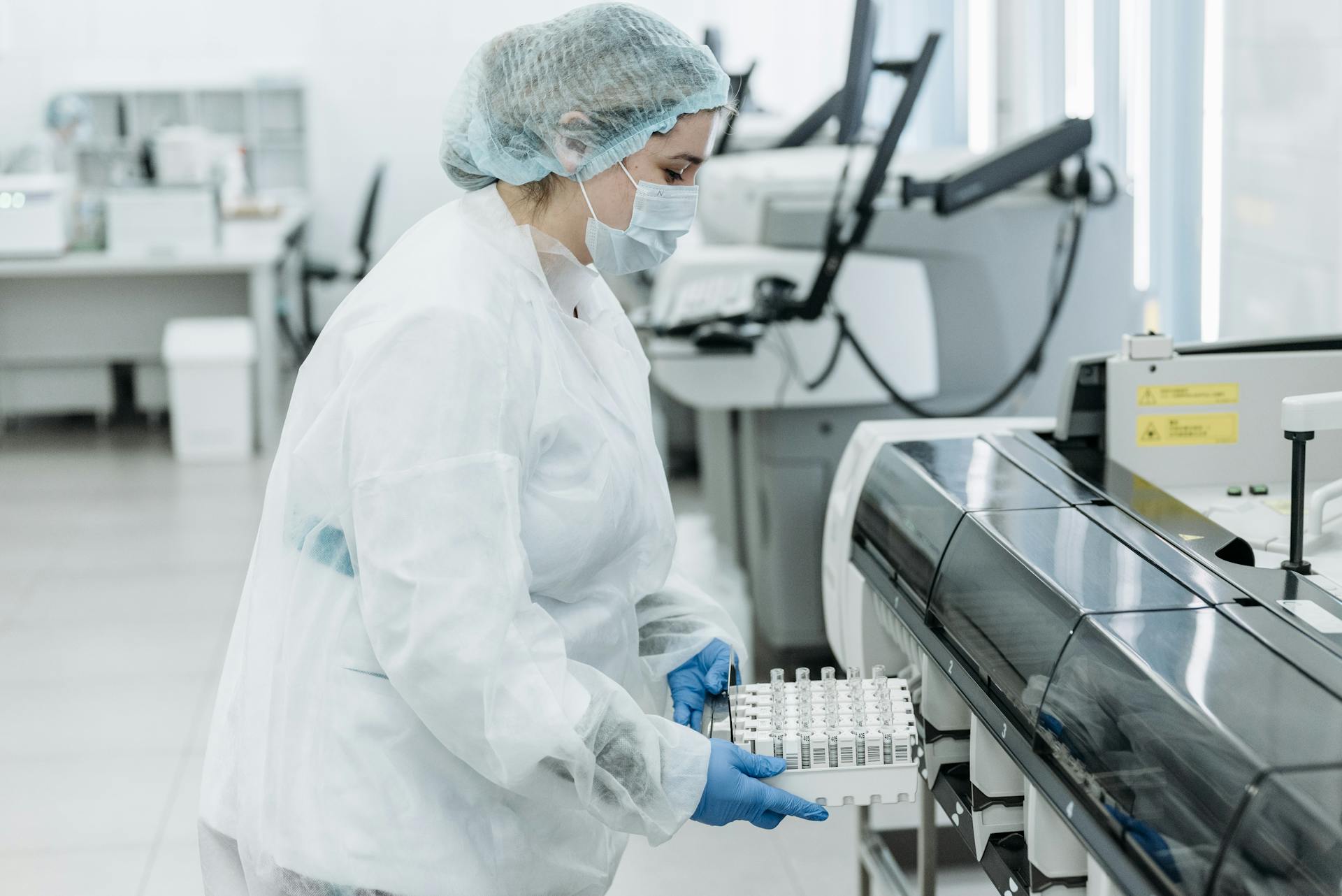 Medical Practitioner holding a Rack of Test Tube Samples