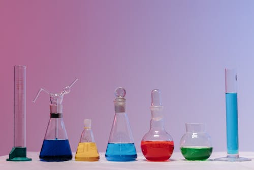 Free Different Laboratory Glassware With Colored Liquid Stock Photo