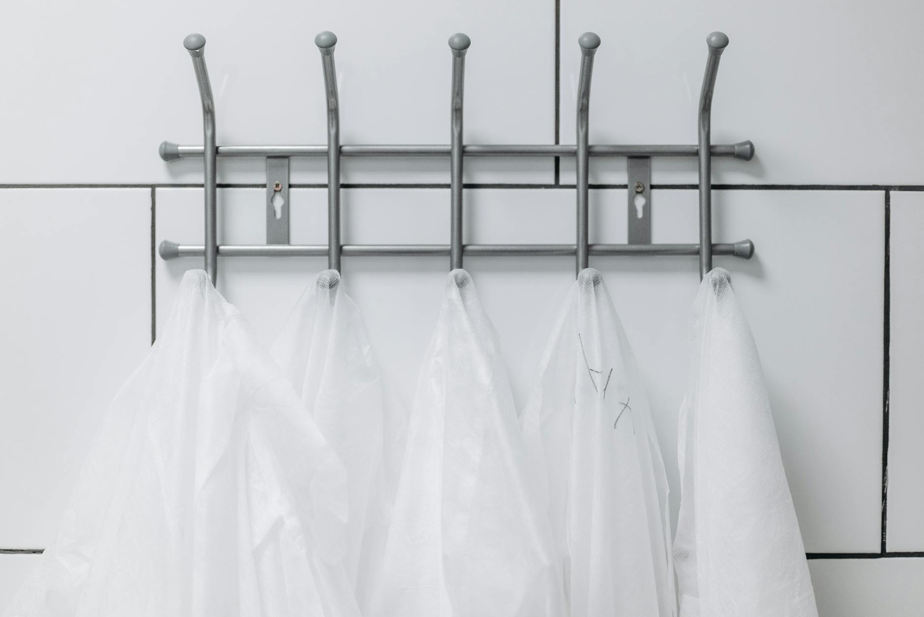 Revolutionize Your Fitness Routine with These 5 Mind-Blowing Wall Mount Exercise Equipment Ideas 9 https://www.pexels.com/photo/lab-coats-hanging-on-metal-hanger-8442646/
