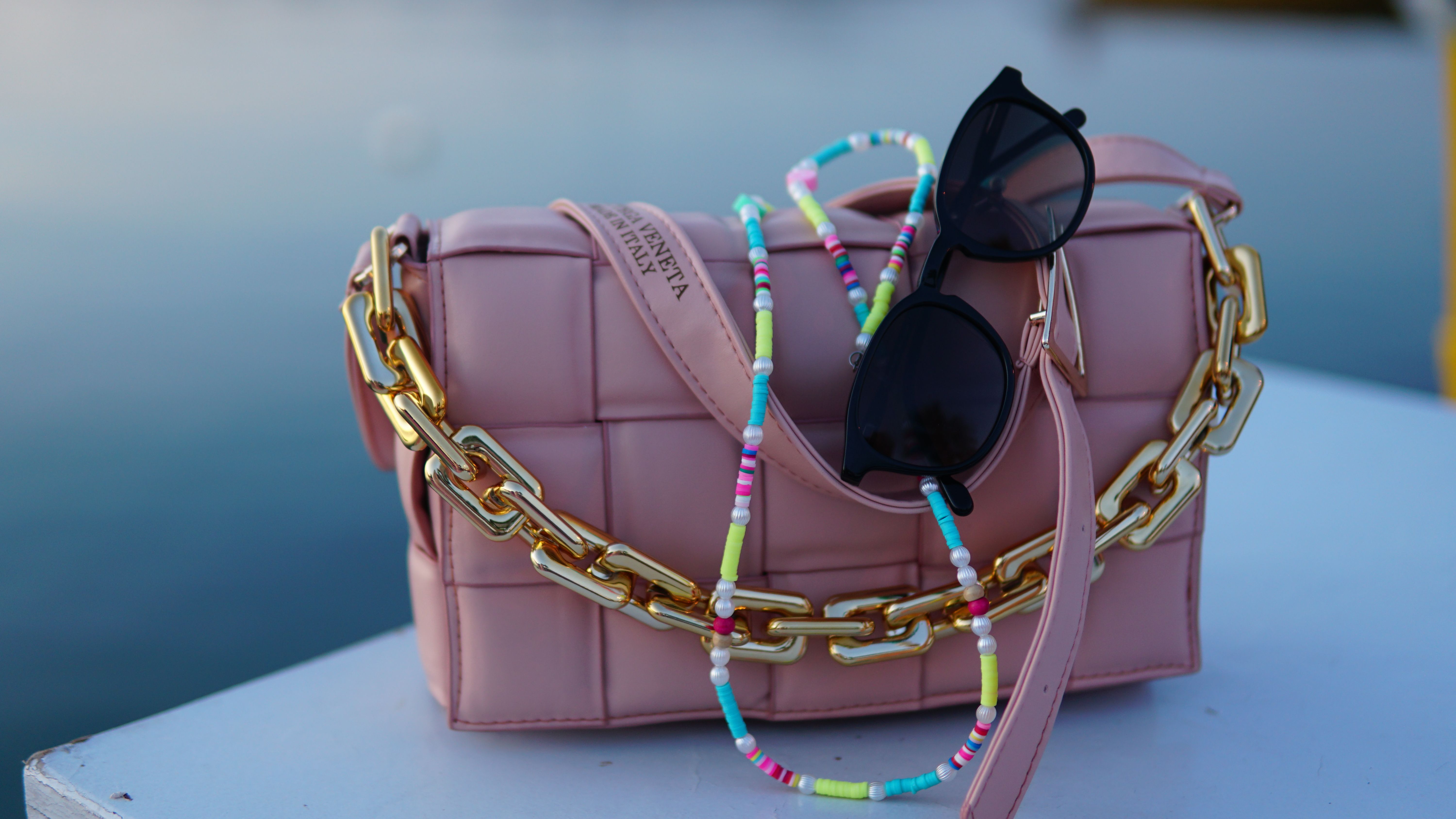 Suede Bags, Wire Sunglasses, Big Earrings: Summer 2026's Accessory Edit