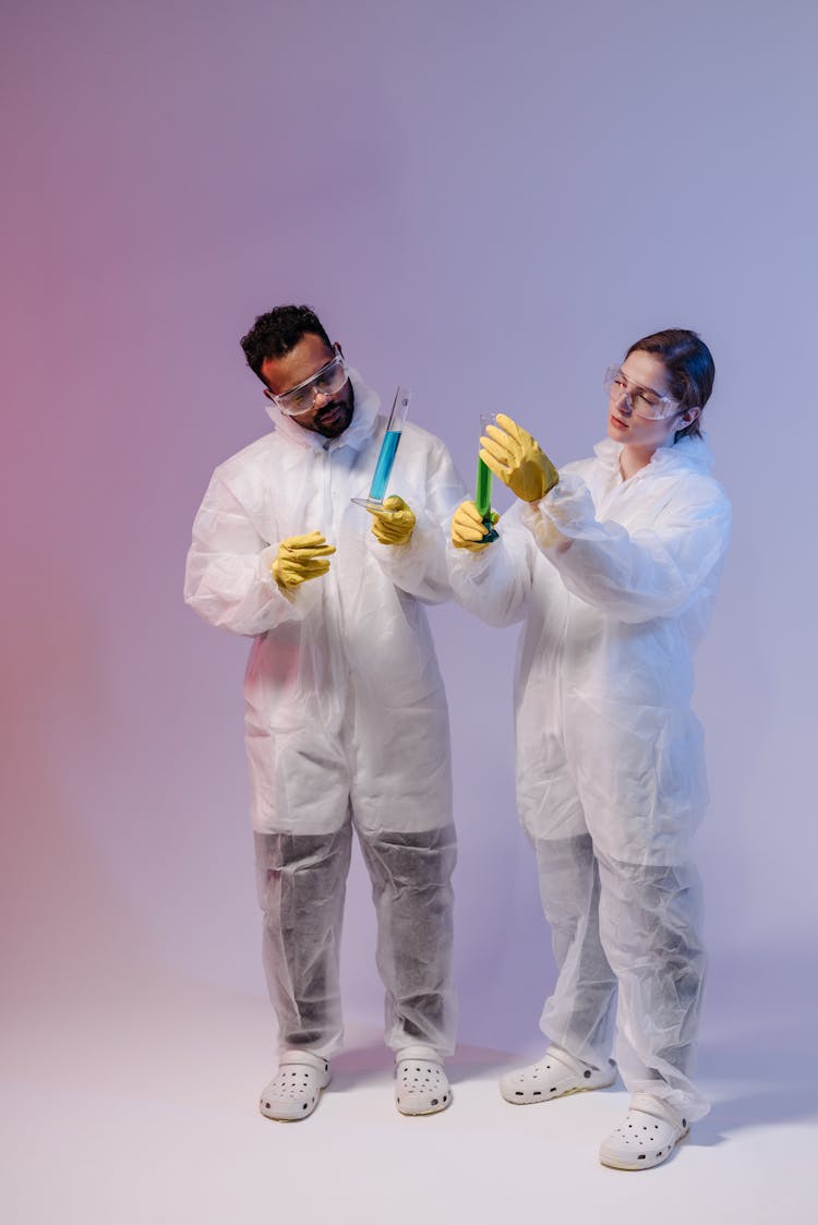 Scientists Holding Test Tubes