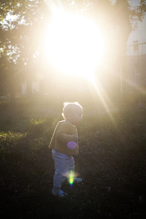 Baby Boy Standing on Grass