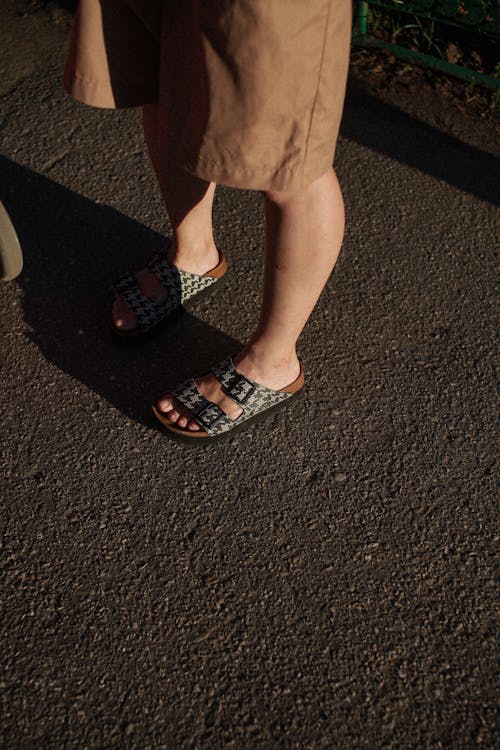 Free A Person Wearing Sandals Stock Photo