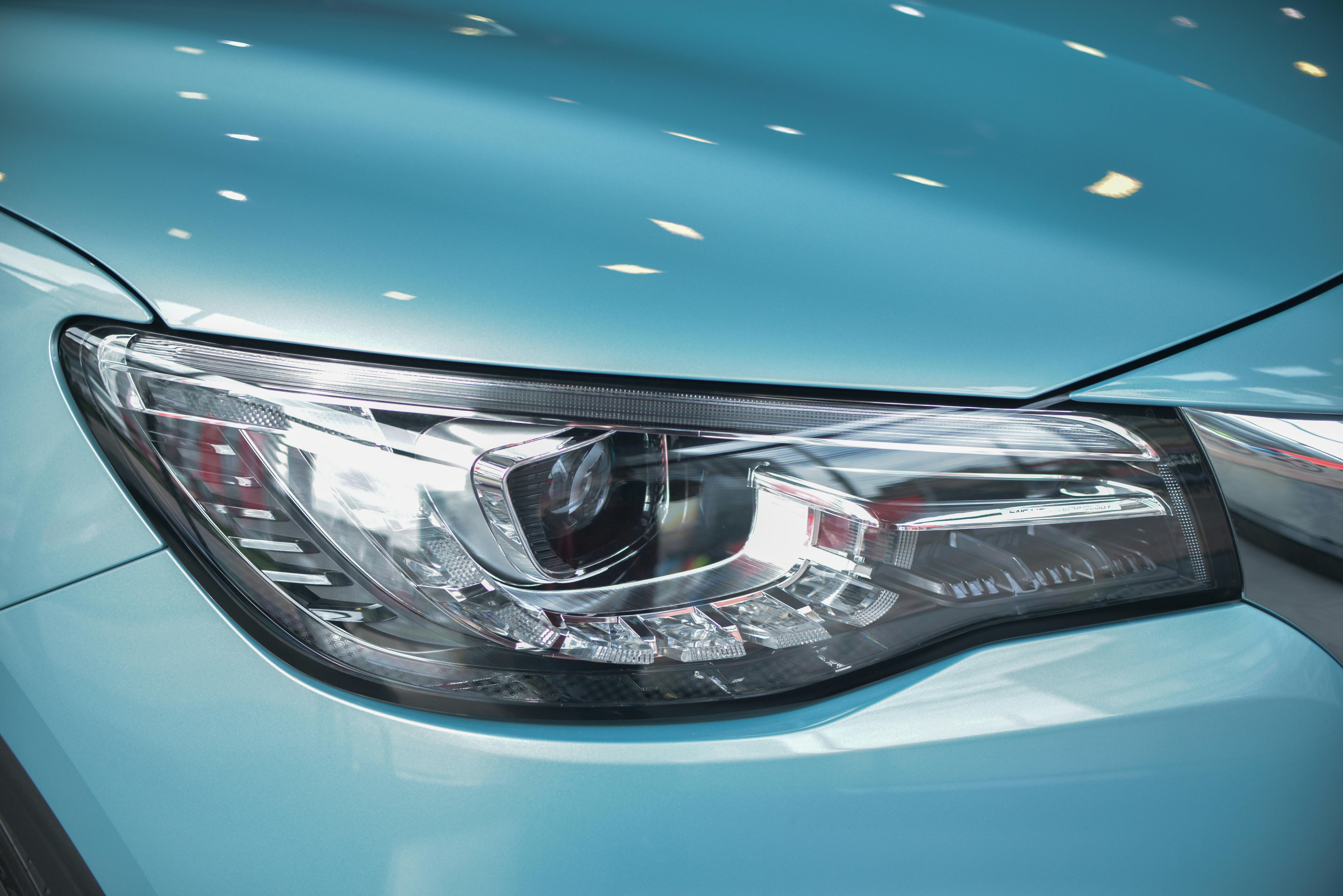 Blue and Silver Car in a Blue Room