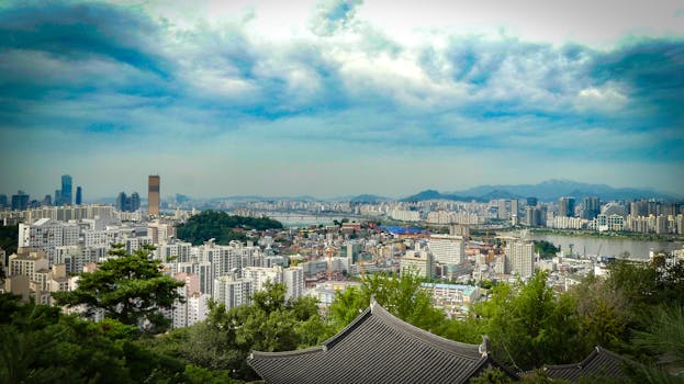 Discover the stunning urban landscape of Seoul with its modern skyline and scenic surroundings.