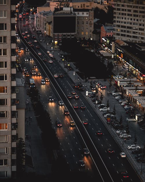 Motor Vehicles on City roads at Night
