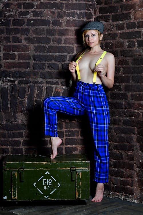 Topless Woman Wearing a Checkered Pants