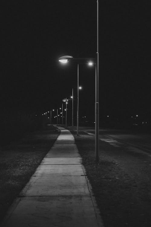 Free Night Street Sidewalk with Street Lamps Stock Photo