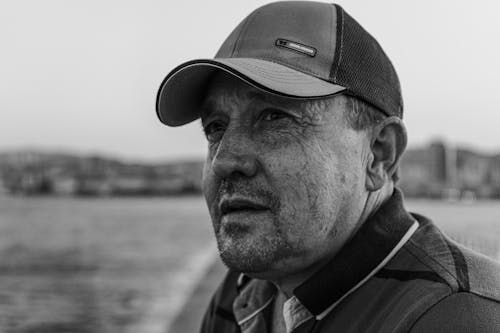 Man in Polo Shirt and Cap