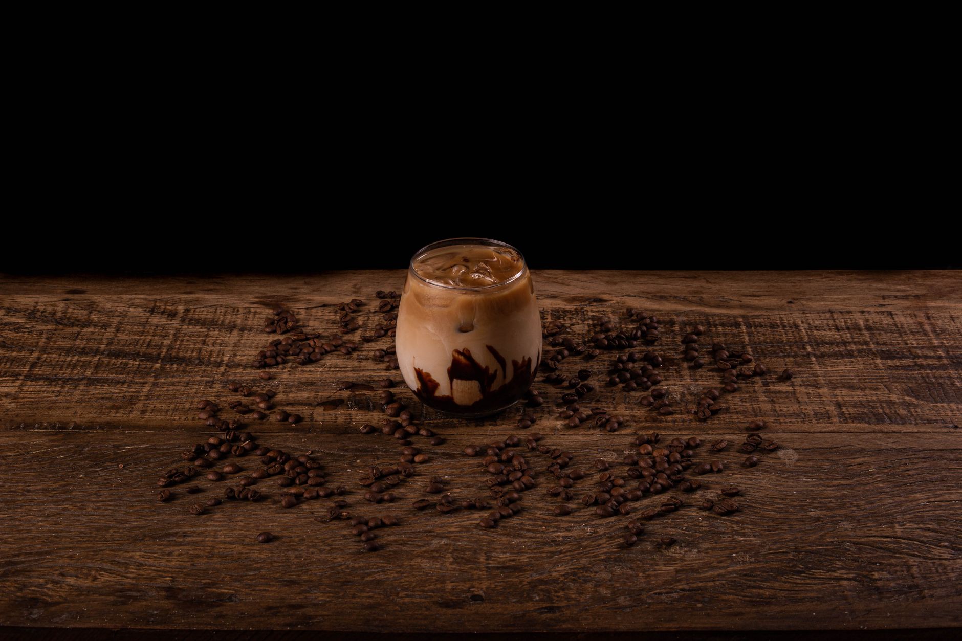 Coffee cup with latte art on a wooden table
