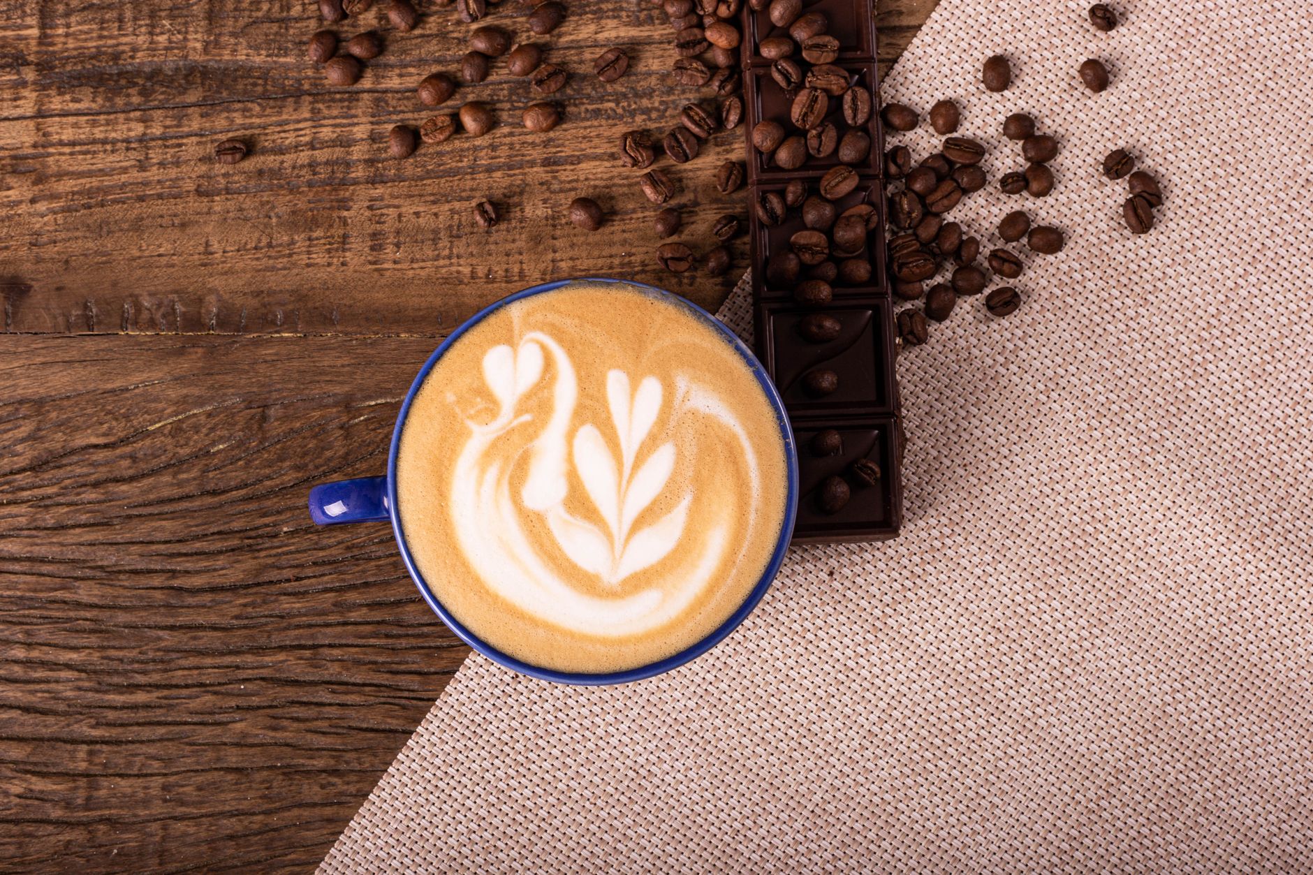 Barista pouring fresh Gesha coffee from a kettle with precision