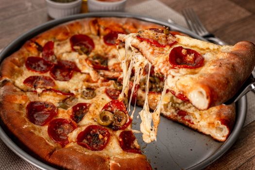 Mouthwatering pepperoni pizza with gooey cheese, fresh from the oven.