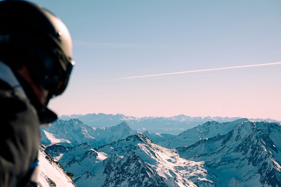 A breathtaking winter view from a skier's perspective in the Austrian Alps.