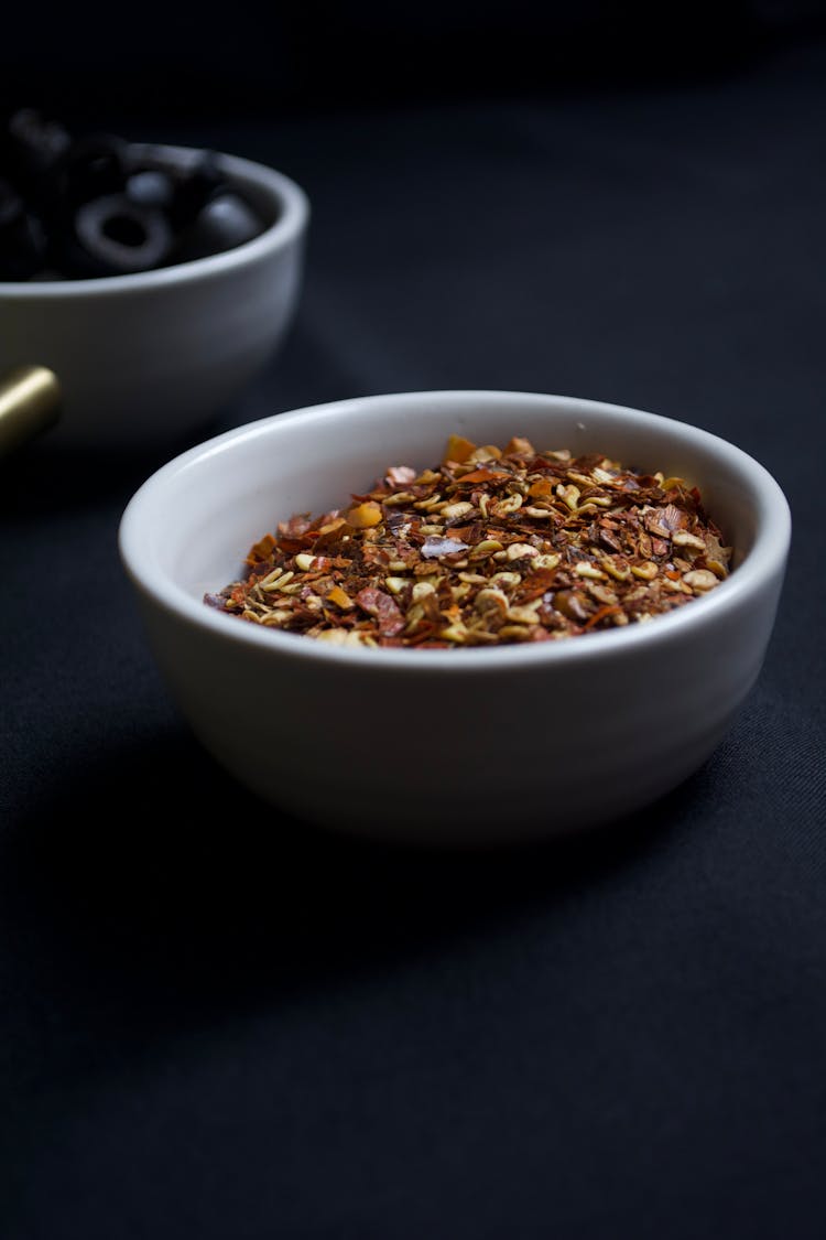 Chili Flakes In A Ceramic Bowl 