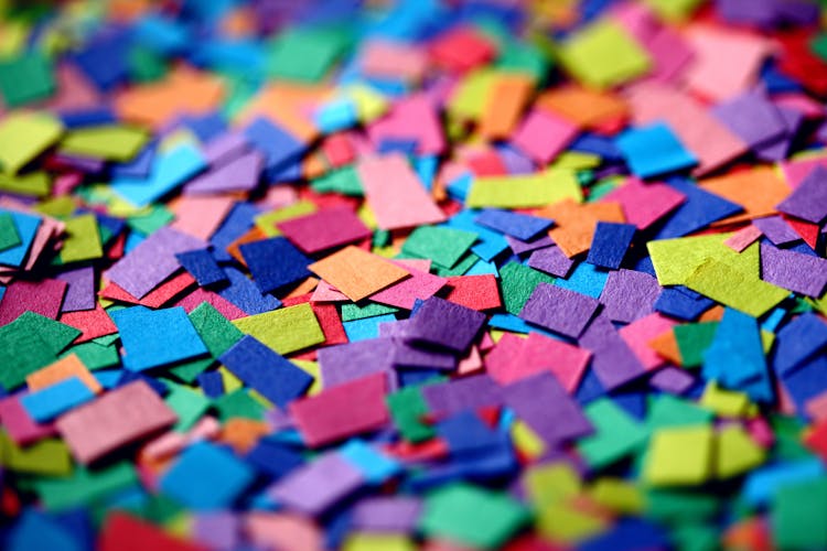 Close Up Of Colorful Paper Confetti Square Shapes