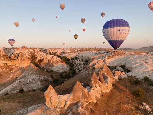 Free Hot Air Balloons Over Rocky Mountains Stock Photo