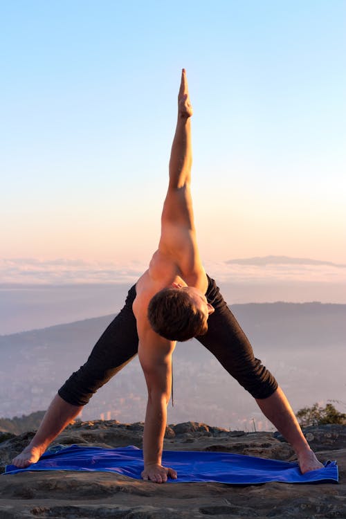 Free Topless Man doing a Yoga Pose Stock Photo