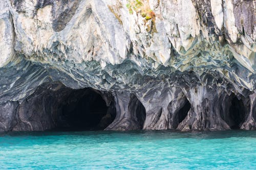 Cave on a Body of Water 
