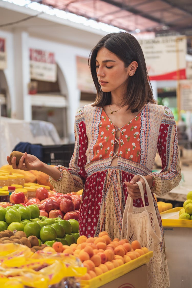 Woman Picking Groceries At A Food Market