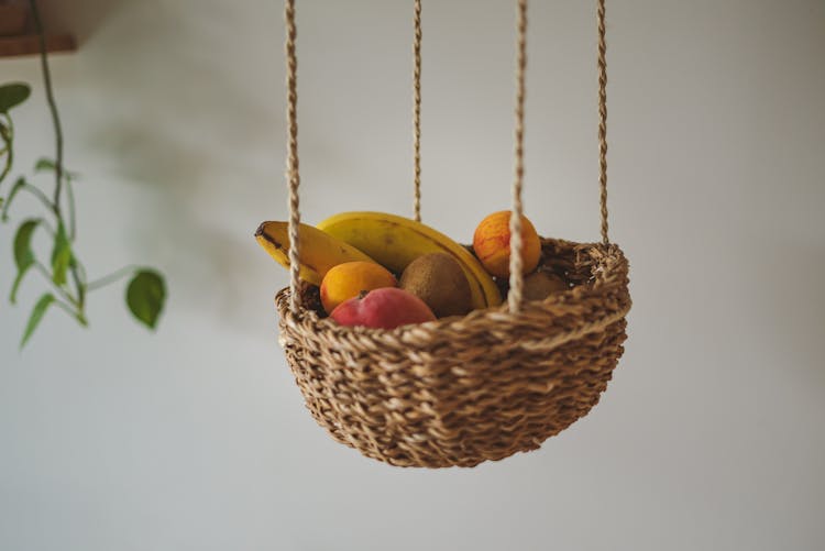 An Assorted Fruits On A Woven Basket