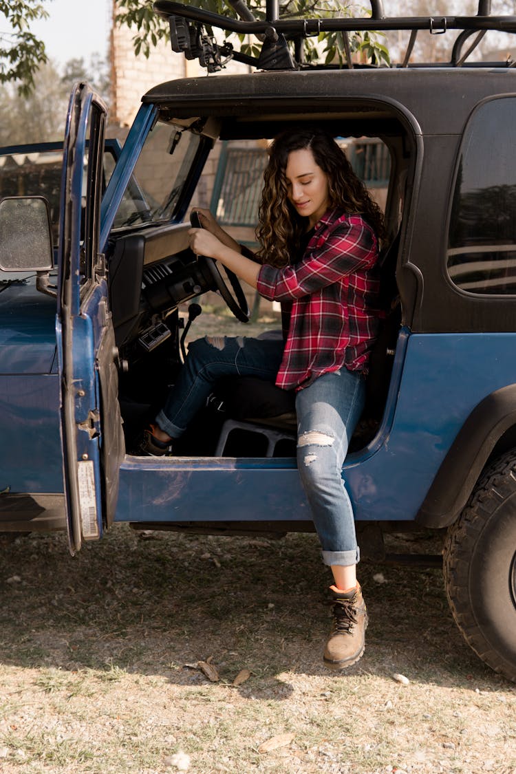 Woman Going Out Of A Truck 