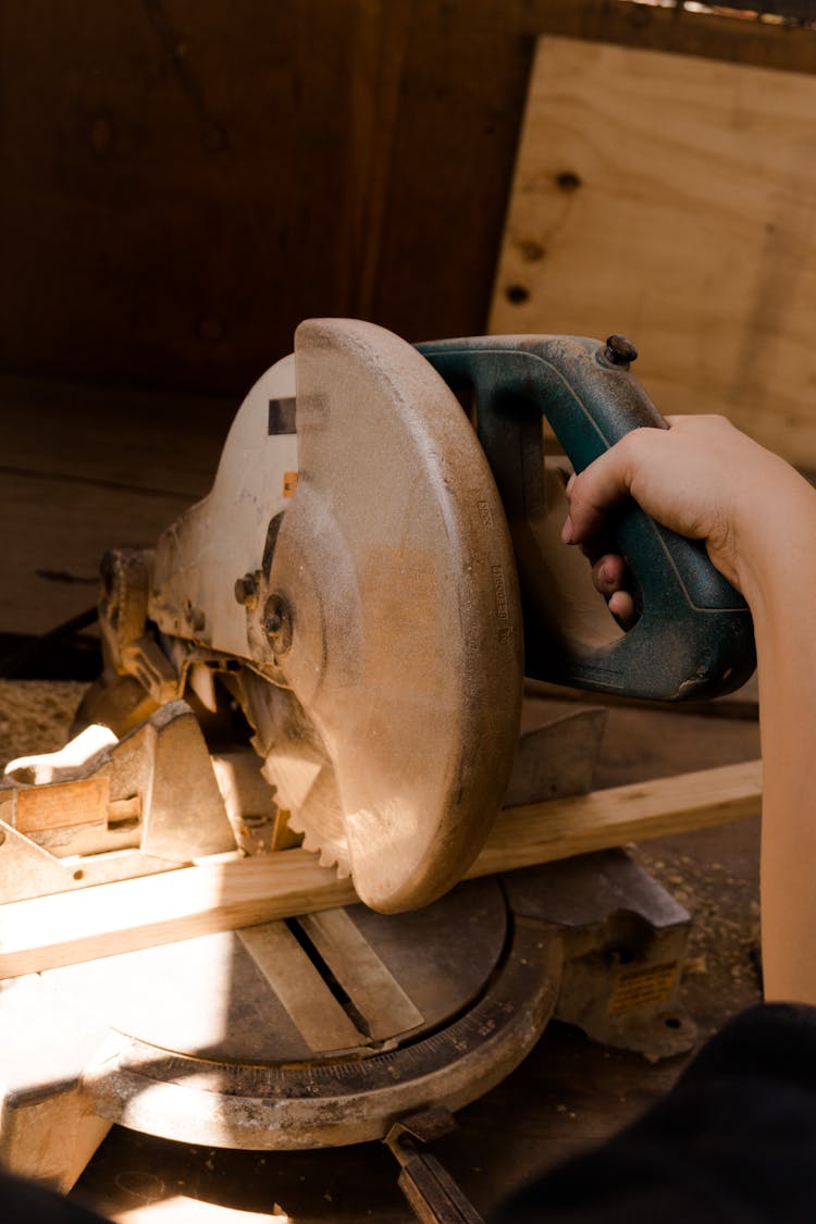 Person Using A Grinding Machine 